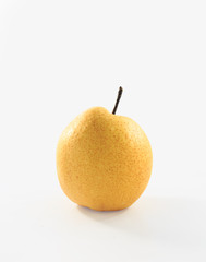 Pear shot against a solid color background