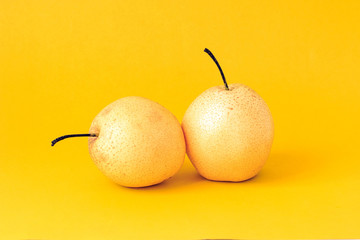Pear shot against a solid color background