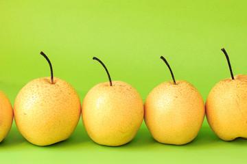 Pear shot against a solid color background