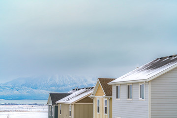 Houses at a town near a magnificent mountain viewed during winter season