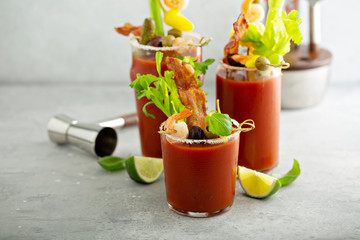 Spicy bacon bloody mary with variety of toppings