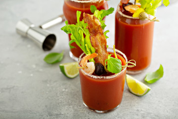 Spicy bacon bloody mary with variety of toppings © fahrwasser