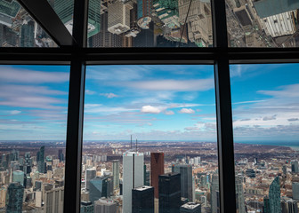 Fototapeta na wymiar Looking through the windows over the city