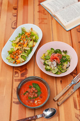 Three course vegetarian lunch: salad with quinoa, mini-corn and chickpea, gazpacho and summer veggie salad