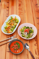 Three course vegetarian lunch: salad with quinoa, mini-corn and chickpea, gazpacho and summer veggie salad