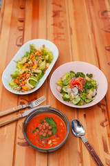 Three course vegetarian lunch: salad with quinoa, mini-corn and chickpea, gazpacho and summer veggie salad