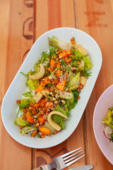 Vegetarian lunch: salad with quinoa, mini-corn and chickpea