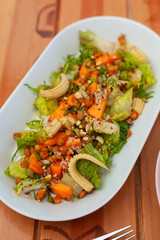 Vegetarian lunch: salad with quinoa, mini-corn and chickpea