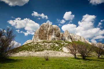 Landscape with Chalk cliffs. Late Cretaceous. Landscape with clouds.