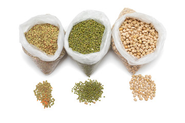 groats mung bean, peas, lentils on a white background. Bean in transparent bags, top view