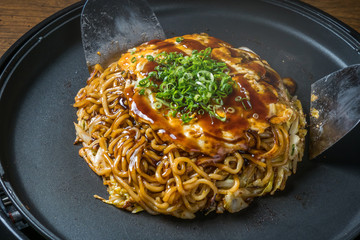 お好み焼き 広島焼き Okonomiyaki is a Japanese-style pancake