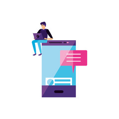 young man using laptop with smartphone