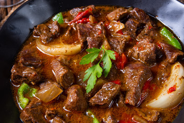 classic beef goulash with peppers and onions
