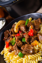 Fussili noodle with klaschise spicy goulash and paprika