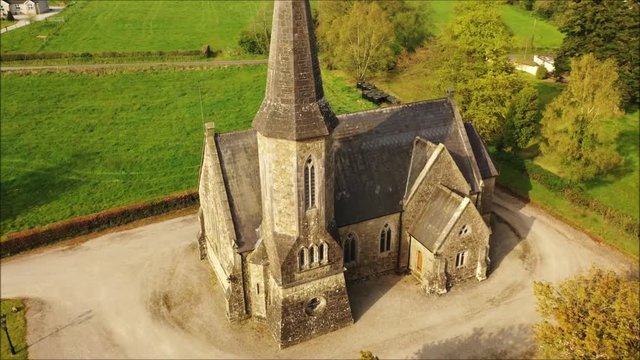 Aerial footage of gothic style church in Cooneen, Ireland