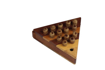 Brain teaser game with pegs on a wooden triangle