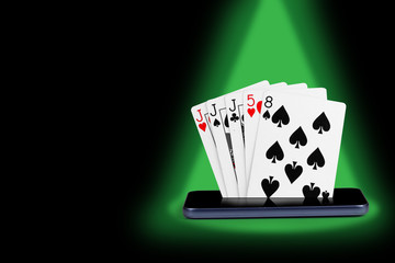 smartphone with poker cards, card game Trio