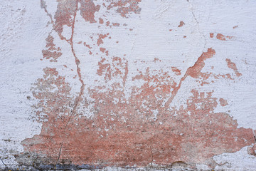 Texture, wall, concrete, it can be used as a background. Wall fragment with scratches and cracks