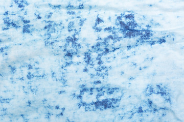Blue and white denim fabric texture.