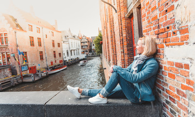 Fototapeta premium Woman tourist in Bruges. Country Sightseeing, Travel to Belgium