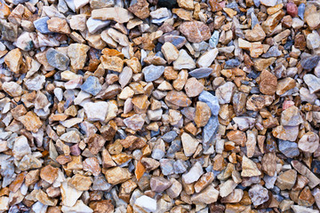 Beige gravel stone floor texture background