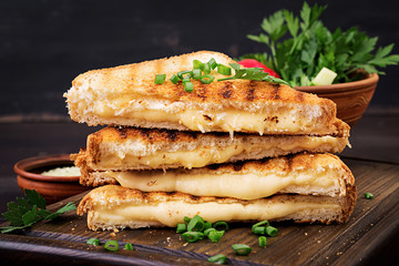 American hot cheese sandwich. Homemade grilled cheese sandwich for breakfast.