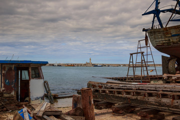 Abandoned fishing boats on the harbor, Italy.