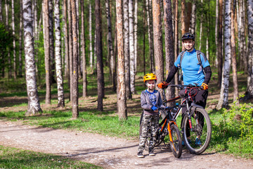 Male cyclist with his son