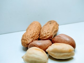 Peanuts on white background