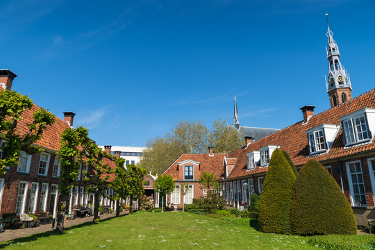 Sint Anthony Gasthuis with old almshouses around a small, public courtyard  in the Dutch city of Groningen. Netherlands