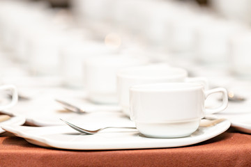 White coffee cup placed on the table for break time