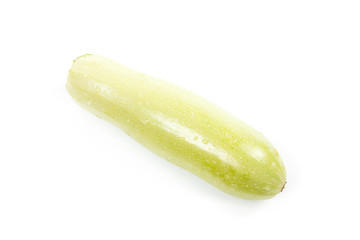 Fresh green zucchini on white background.