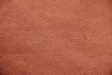 Fototapeta premium The texture of genuine leather. Impeccable and stylish background. Beautiful stylish background. Natural skin texture close up. Brown background. The structure of the leather material brown shades.