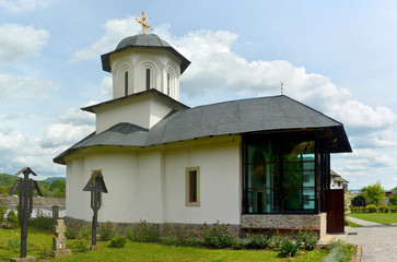 Fototapeta na wymiar the Ostrov monastery in Calimanesti city - Romania 12.May.2019 is an Orthodox monastery built on an island on the Olt River