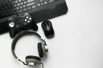 Modern gaming accessories on light background