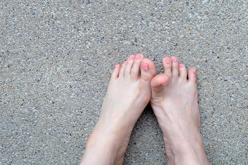 Female Foot Top View. Pink Nail Polish Manicure
