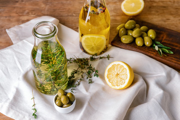 Tasty olive oil on table