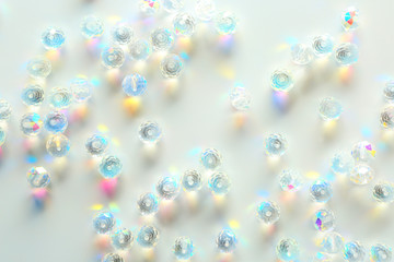 Shiny beads on white background