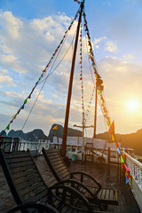 Halong Bay Top Destinations Vietnam. Cruise wooden junk sailing rocky islands the emerald waters of...