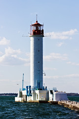 red lighthouse building Harbor