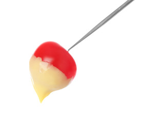 Fondue stick with cheese covered tomato on white background