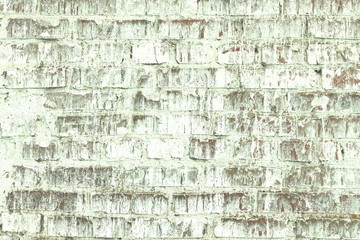 old shabby wall of green brick color as  abstract background in loft style