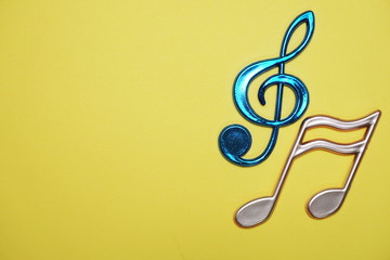 Music notes with space copy on yellow background