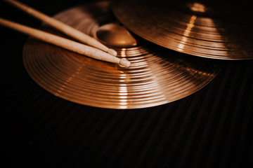 Cymbals on the dark background