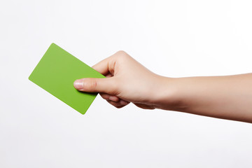 Business image using hand and card.