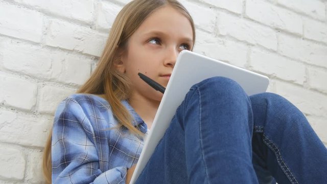 Child Studying on Tablet, Girl Writing for School Class, Learning Doing Homework