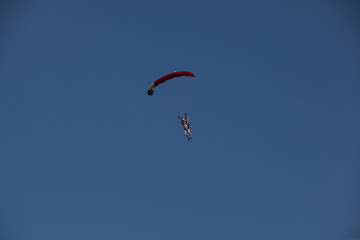 Skydive, people in the sky, under clouds