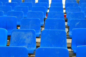 blue empty seats in stadium