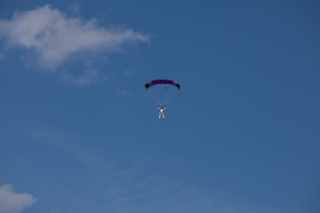 Skydive, people in the sky, under clouds