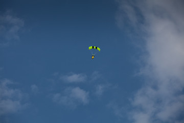 Skydive, people in the sky, under clouds